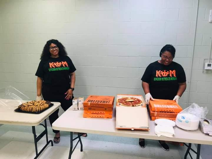 Kingdom Outreach Ministry team serving the community